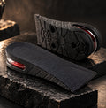 Semelles rehaussantes noires ELITE — vue principale, fond sombre premium